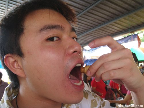 eating sago worms